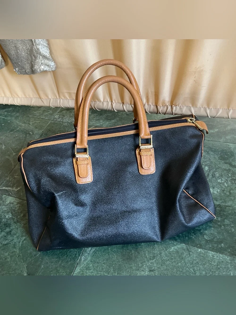 Black Leather Duffel Bag with Brown Trim and Olive Pattern Accent
